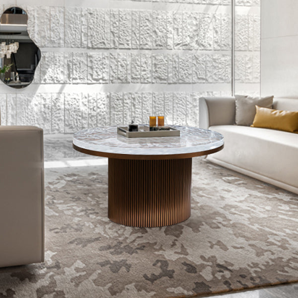 Heldere glam metalen enkele ronde voetstuk koffiecocktailtafel