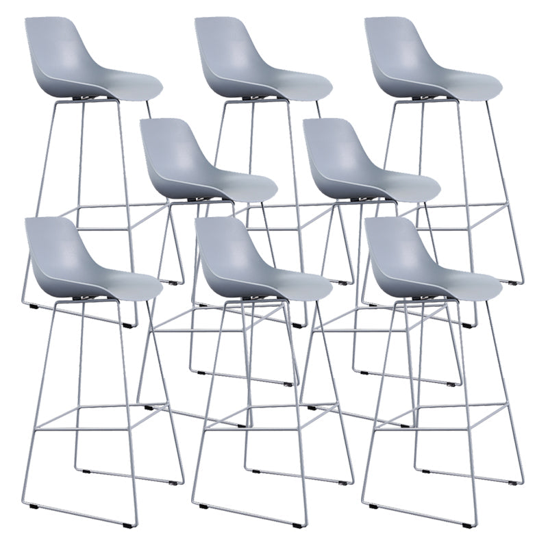 Taburete de barra sin brazo de plástico de plástico contemporáneo con base de metal