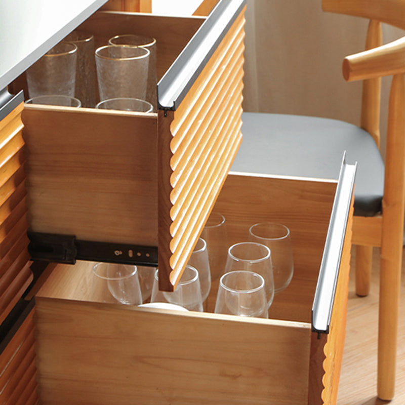 Mesa de cocina moderna de piedra negra con base de madera sólida y cajones