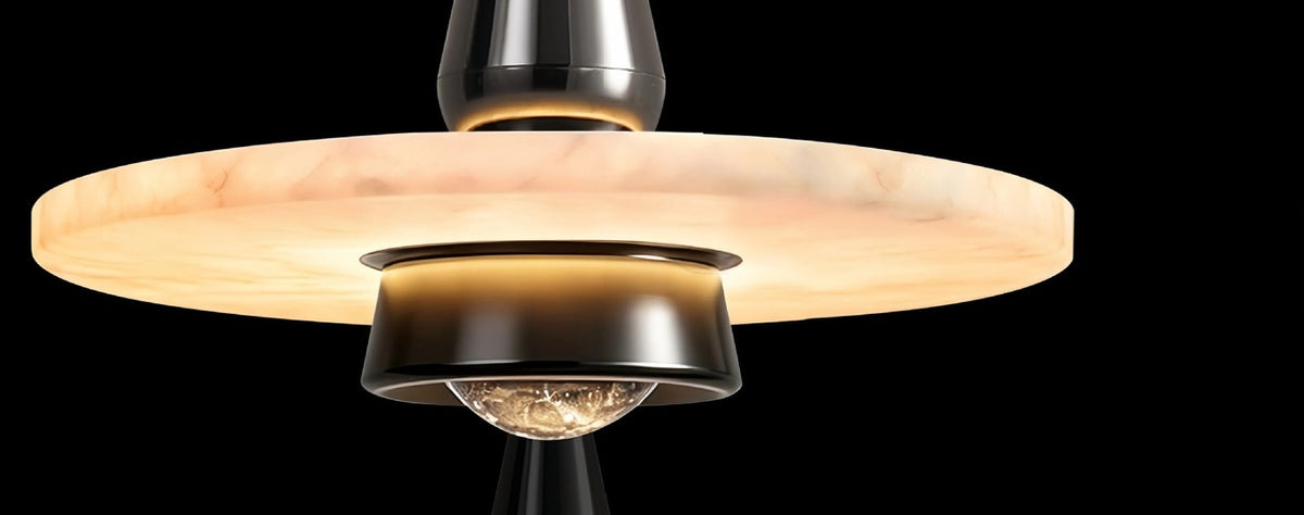 Alabaster Disc Pendant Light with Black Cone Body, Fixed or Lift Cord – lit alabaster disc with warm veining and crystal LED lens, on black