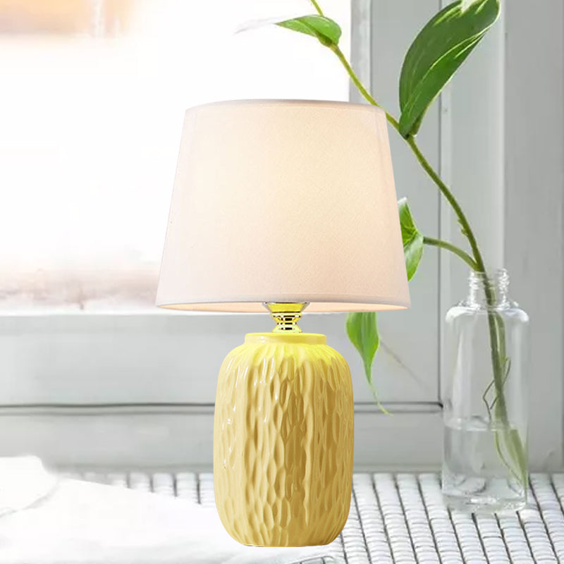 Single Hammered Ceramic Night Lamp Modern Pink/Blue/Yellow Oval Table Lighting with Tapered Lampshade Clearhalo 'Lamps' 'Table Lamps' Lighting' 1136144