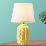 Single Hammered Ceramic Night Lamp Modern Pink/Blue/Yellow Oval Table Lighting with Tapered Lampshade Clearhalo 'Lamps' 'Table Lamps' Lighting' 1136145