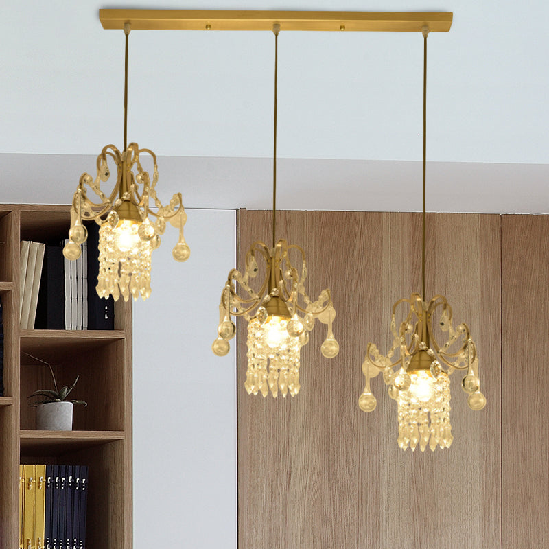Crystal Drip Cylindrical Island Lighting Minimalist 3 Bulbs Brass Suspension Lamp over Dining Table Brass Clearhalo 'Ceiling Lights' 'Modern Pendants' 'Modern' 'Pendant Lights' 'Pendants' Lighting' 1136309