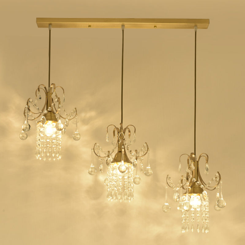 Crystal Drip Cylindrical Island Lighting Minimalist 3 Bulbs Brass Suspension Lamp over Dining Table Clearhalo 'Ceiling Lights' 'Modern Pendants' 'Modern' 'Pendant Lights' 'Pendants' Lighting' 1136311