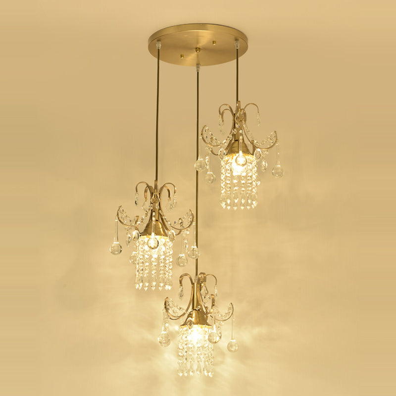 Cylinder Multi Ceiling Light Modernist Crystal Droplet 3 Lights Dining Room Pendant in Brass Clearhalo 'Ceiling Lights' 'Modern Pendants' 'Modern' 'Pendant Lights' 'Pendants' Lighting' 1136318