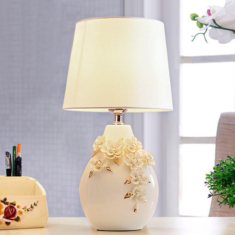 Ceramic White Table Lamp Magnolia-Embellished Vase Single Traditional Night Light with Shade, 18"/19.5" Wide Clearhalo 'Lamps' 'Table Lamps' Lighting' 1136581