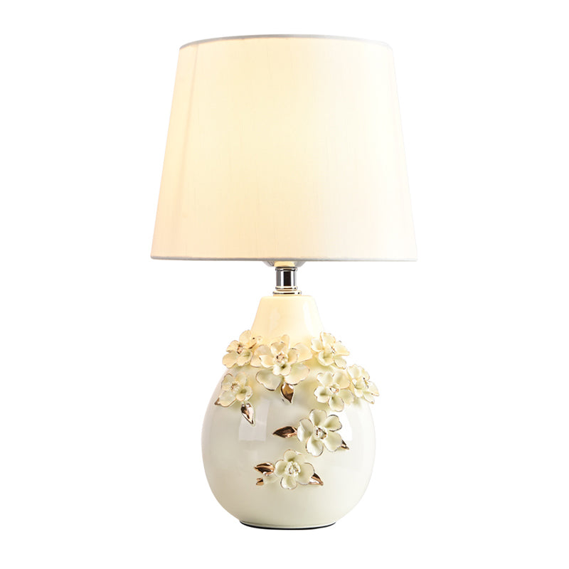 Ceramic White Table Lamp Magnolia-Embellished Vase Single Traditional Night Light with Shade, 18"/19.5" Wide Clearhalo 'Lamps' 'Table Lamps' Lighting' 1136582