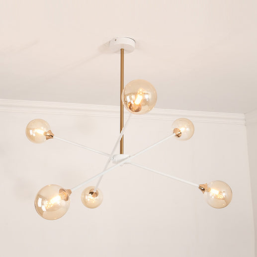 Contemporary White Arm Chandelier Line Metallic Amber//Clear/Silver/Smoke Grey/White Suspension Light with Spherical Shade for Study Room 6 Amber Clearhalo 'Ceiling Lights' 'Chandeliers' 'Clear' 'Industrial' 'Modern Chandeliers' 'Modern' 'Tiffany' 'Traditional Chandeliers' Lighting' 116403