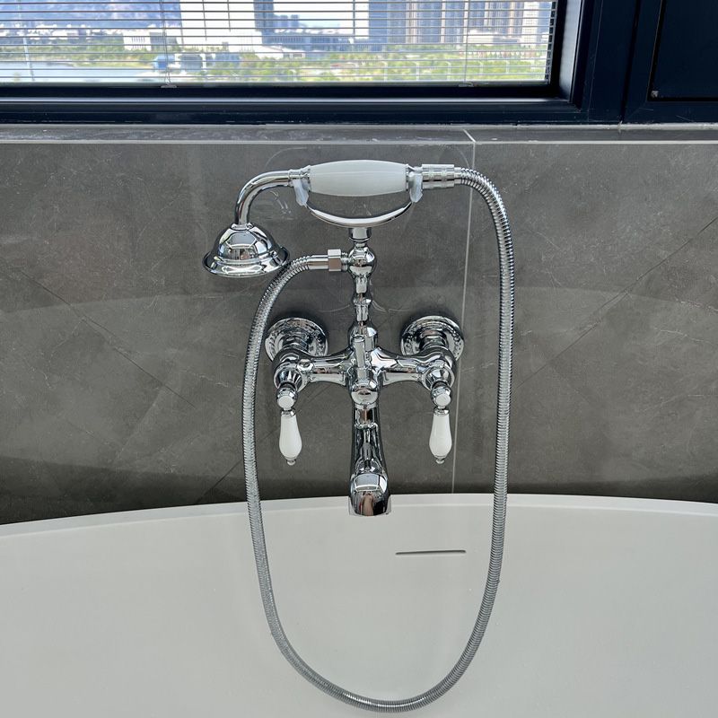 Gold and Silver Claw Foot Tub Faucet Wall Mounted 2-Handle Tub Filler with Handheld Shower Clearhalo 'Bathroom Remodel & Bathroom Fixtures' 'Bathtub Faucets' 'bathtub_faucets' 'Home Improvement' 'home_improvement' 'home_improvement_bathtub_faucets' 1200x1200_11e44e9e-da39-4bcd-a928-e2418126bc2d