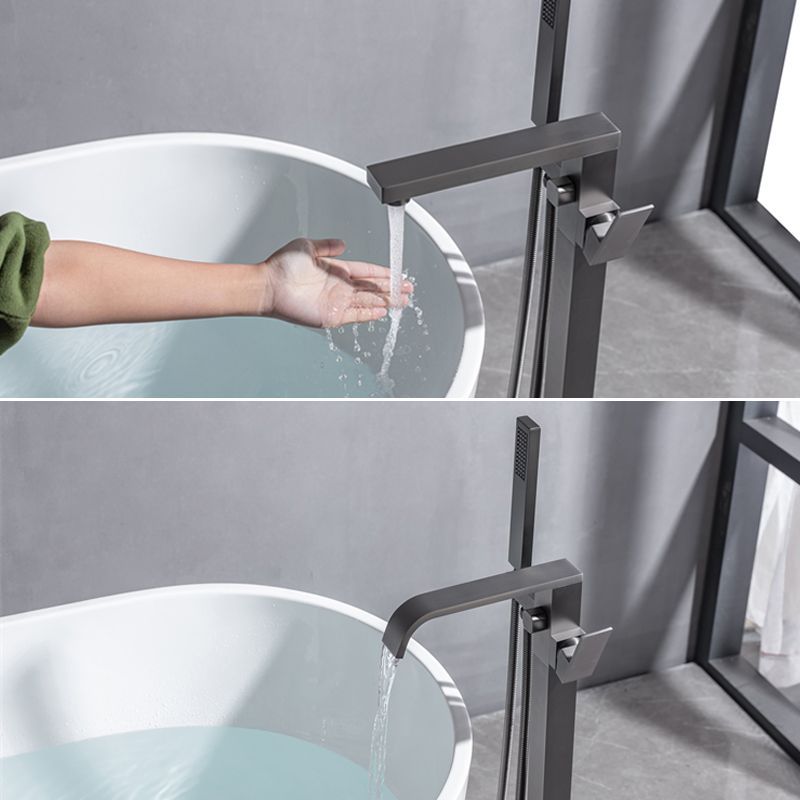 Floor Mounted Metal Freestanding Tub Filler Swivel Freestanding Faucet with Spray Gun Clearhalo 'Bathroom Remodel & Bathroom Fixtures' 'Bathtub Faucets' 'bathtub_faucets' 'Home Improvement' 'home_improvement' 'home_improvement_bathtub_faucets' 1200x1200_368891c9-2646-4f7f-a36b-79d457a2f57e