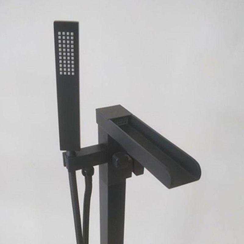 Brass Freestanding Tub Filler with Waterfall Spout Floor Mounted Bathroom Faucet Clearhalo 'Bathroom Remodel & Bathroom Fixtures' 'Bathtub Faucets' 'bathtub_faucets' 'Home Improvement' 'home_improvement' 'home_improvement_bathtub_faucets' 1200x1200_45d6f833-75a0-4a69-b435-664b89a7f1e5