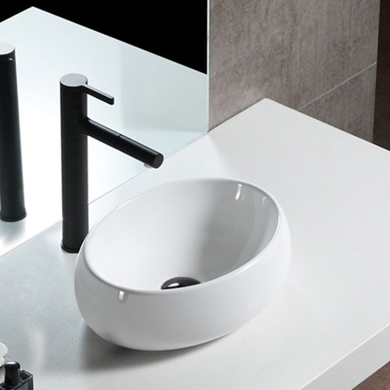 Bathroom Ceramic Sink Round Rod Handle Anti-spill Modern Faucet Sink Clearhalo 'Bathroom Remodel & Bathroom Fixtures' 'Bathroom Sinks & Faucet Components' 'Bathroom Sinks' 'bathroom_sink' 'Home Improvement' 'home_improvement' 'home_improvement_bathroom_sink' 1200x1200_49bdd261-86cf-46c2-8700-cb7dc1e681b4