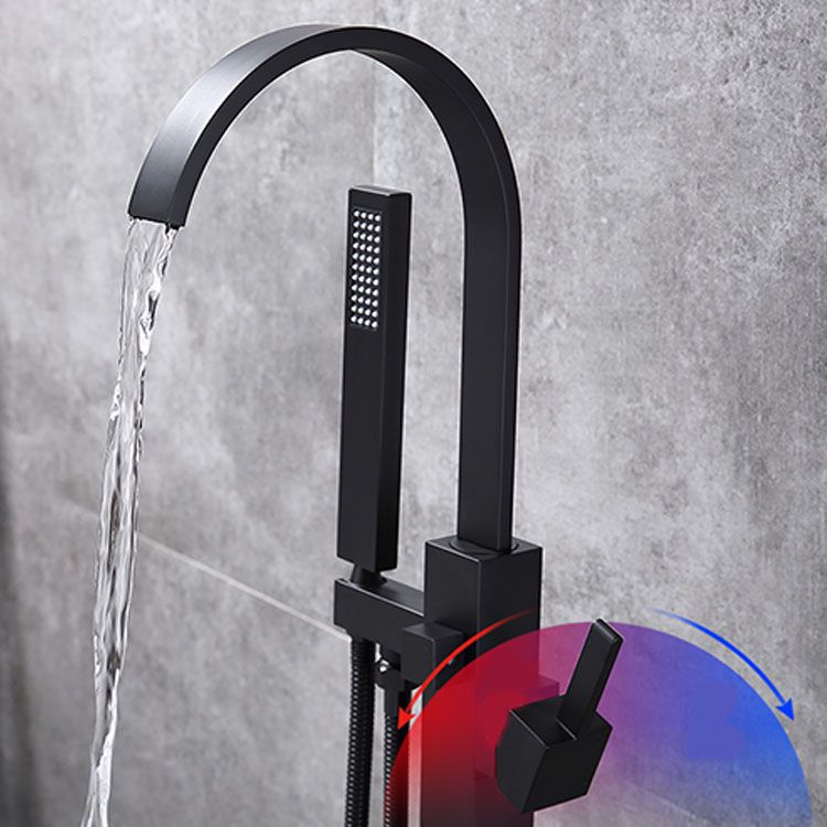 Contemporary Brass Freestanding Tub Filler with Hose Floor Mounted Bathroom Faucet Clearhalo 'Bathroom Remodel & Bathroom Fixtures' 'Bathtub Faucets' 'bathtub_faucets' 'Home Improvement' 'home_improvement' 'home_improvement_bathtub_faucets' 1200x1200_628e044e-7c5d-4cb4-ac4b-3716fb3e1cd3