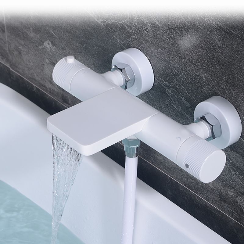 Waterfall Tub Filler Copper Wall-Mounted Double Knob Handle Tub Filler with Handshower Clearhalo 'Bathroom Remodel & Bathroom Fixtures' 'Bathtub Faucets' 'bathtub_faucets' 'Home Improvement' 'home_improvement' 'home_improvement_bathtub_faucets' 1200x1200_7ba27ac5-e0d6-4d8c-b762-253c0c385a61