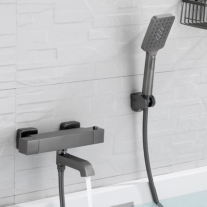 Black Tub Filler Wall-Mounted Brass Single Knob Handle Swivel Tub Filler with Handshower Clearhalo 'Bathroom Remodel & Bathroom Fixtures' 'Bathtub Faucets' 'bathtub_faucets' 'Home Improvement' 'home_improvement' 'home_improvement_bathtub_faucets' 1200x1200_ca8b3c37-c12b-42bc-8f70-78d4ee400196