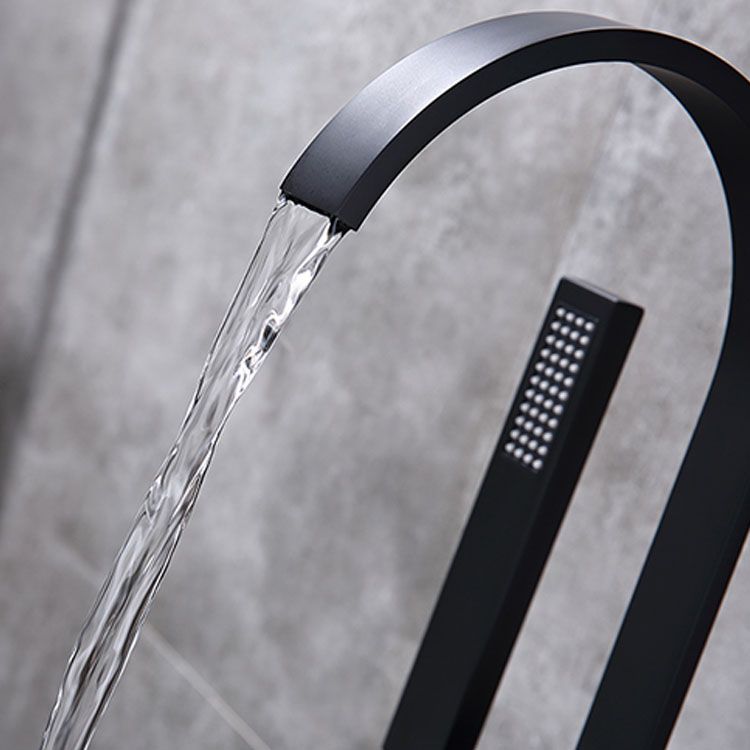 Contemporary Brass Freestanding Tub Filler with Hose Floor Mounted Bathroom Faucet Clearhalo 'Bathroom Remodel & Bathroom Fixtures' 'Bathtub Faucets' 'bathtub_faucets' 'Home Improvement' 'home_improvement' 'home_improvement_bathtub_faucets' 1200x1200_d7ad40cf-7c6a-4070-9473-312097f88d79