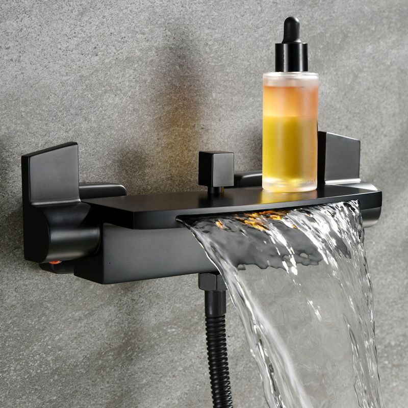 Wall Mounted Metal Tub Filler Low Arc Waterfall Tub Faucet Trim Clearhalo 'Bathroom Remodel & Bathroom Fixtures' 'Bathtub Faucets' 'bathtub_faucets' 'Home Improvement' 'home_improvement' 'home_improvement_bathtub_faucets' 1200x1200_e6ffd945-365e-44d6-85fc-2495b6463e3f