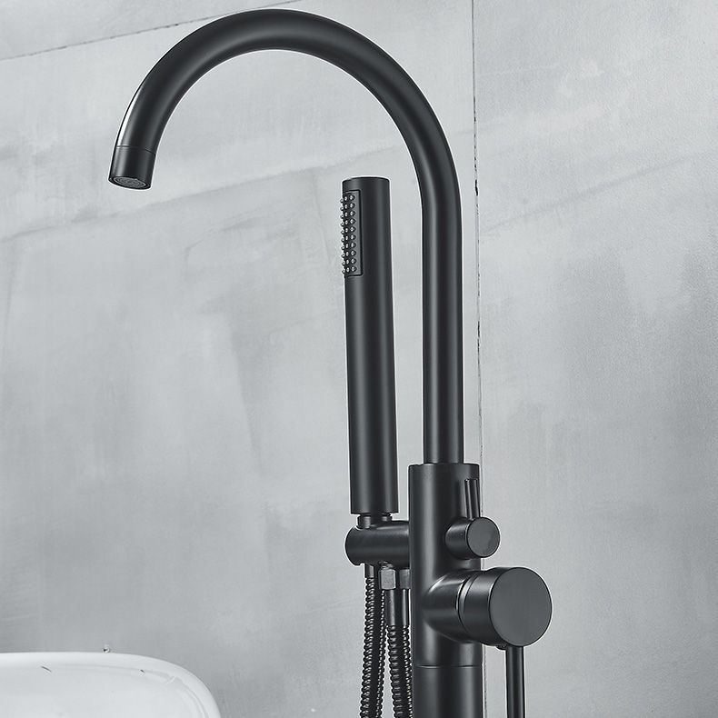 Modern High Arc Faucet Brass Floor Mounted Free Standing Tub Filler Faucet Clearhalo 'Bathroom Remodel & Bathroom Fixtures' 'Bathtub Faucets' 'bathtub_faucets' 'Home Improvement' 'home_improvement' 'home_improvement_bathtub_faucets' 1200x1200_f7e28ad6-97c5-4160-a01d-3dc4a5593571