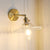 1 Light Clear Glass Wall Sconce Light Industrial Brass Scalloped Living Room Lighting Fixture Clear Clearhalo 'Cast Iron' 'Glass' 'Industrial' 'Modern wall lights' 'Modern' 'Tiffany' 'Traditional wall lights' 'Wall Lamps & Sconces' 'Wall Lights' Lighting' 1206120