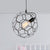 1 Light Wire Cage Pendant Lighting with Honeycomb Design Height Adjustable Simple Black Metal Hanging Lamp Black Clearhalo 'Art Deco Pendants' 'Black' 'Cast Iron' 'Ceiling Lights' 'Ceramic' 'Crystal' 'Industrial Pendants' 'Industrial' 'Metal' 'Middle Century Pendants' 'Pendant Lights' 'Pendants' 'Rustic Pendants' 'Tiffany' Lighting' 1207412