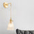 One Bulb Wall Light with Cone Shade Clear Textured Glass Industrial Bedroom Sconce Lighting Fixture Clear Clearhalo 'Cast Iron' 'Glass' 'Industrial wall lights' 'Industrial' 'Middle century wall lights' 'Modern' 'Tiffany' 'Traditional wall lights' 'Wall Lamps & Sconces' 'Wall Lights' Lighting' 1207513