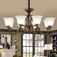 Scrolled Arm Metal Pendant Chandelier Rustic Style 3/5/6 Bulbs Guest Room Ceiling Hang Fixture in Brown 8 Brown Clearhalo 'Ceiling Lights' 'Chandeliers' Lighting' options 1220670_946402b5-effa-495e-bb65-12b9f47a7359