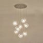 Rock Clear Glass Cluster Pendant Contemporary 5/6/8 Lights White Led Hanging Light Fixture with Round/Linear Canopy 8 Clear Round Clearhalo 'Ceiling Lights' 'Glass shade' 'Glass' 'Modern Pendants' 'Modern' 'Pendant Lights' 'Pendants' Lighting' 122126