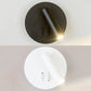 Tube Wall Lamp Simple Style Metallic LED Black/White Wall Sconce with Round Backplate for Living Room, Warm/White Light Clearhalo 'Cast Iron' 'Glass' 'Industrial' 'Modern wall lights' 'Modern' 'Tiffany' 'Traditional wall lights' 'Wall Lamps & Sconces' 'Wall Lights' Lighting' 128703