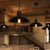 Dome Metal Suspension Light with Cage Shade Nautical 1 Light Farmhouse Pendant Lighting in Black Black Clearhalo 'Art Deco Pendants' 'Black' 'Cast Iron' 'Ceiling Lights' 'Ceramic' 'Crystal' 'Industrial Pendants' 'Industrial' 'Metal' 'Middle Century Pendants' 'Pendant Lights' 'Pendants' 'Rustic Pendants' 'Tiffany' Lighting' 136923
