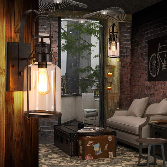 Cylinder Corridor Wall Light Fixture Industrial Clear Glass 1 Light Black Sconce Lamp with Cage Clearhalo 'Cast Iron' 'Glass' 'Industrial wall lights' 'Industrial' 'Middle century wall lights' 'Modern' 'Tiffany' 'Traditional wall lights' 'Wall Lamps & Sconces' 'Wall Lights' Lighting' 138071