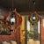 Bronze Kerosene Lamp Shape Pendant Coastal Style Metal 1 Light Bar Hanging Light with Wood Frame Bronze Clearhalo 'Art Deco Pendants' 'Cast Iron' 'Ceiling Lights' 'Ceramic' 'Crystal' 'Industrial Pendants' 'Industrial' 'Metal' 'Middle Century Pendants' 'Pendant Lights' 'Pendants' 'Tiffany' Lighting' 1392177