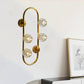 Gold 4 Bulbs Wall Mount Light Modern Ball Clear Crystal Shade Wall Lighting Idea with Oval Frame Clearhalo 'Modern wall lights' 'Modern' 'Wall Lamps & Sconces' 'Wall Lights' Lighting' 1400208