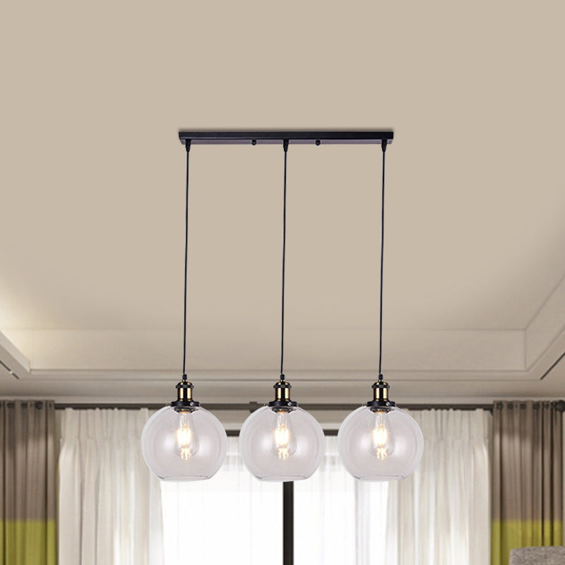 Globe Clear Glass Multi Light Pendant Industrial 3-Light Living Room Hanging Lighting with Linear Canopy Clearhalo 'Ceiling Lights' 'Glass shade' 'Glass' 'Industrial Pendants' 'Industrial' 'Middle Century Pendants' 'Pendant Lights' 'Pendants' 'Tiffany' Lighting' 1401272
