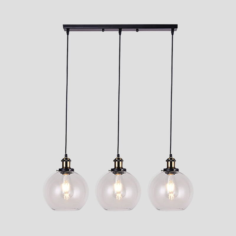 Globe Clear Glass Multi Light Pendant Industrial 3-Light Living Room Hanging Lighting with Linear Canopy Clearhalo 'Ceiling Lights' 'Glass shade' 'Glass' 'Industrial Pendants' 'Industrial' 'Middle Century Pendants' 'Pendant Lights' 'Pendants' 'Tiffany' Lighting' 1401274