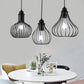 Vintage Onion Caged Hanging Light 3 Bulbs Metallic Pendant Light Fixture in Black for Restaurant Clearhalo 'Ceiling Lights' 'Modern Pendants' 'Modern' 'Pendant Lights' 'Pendants' Lighting' 1401308