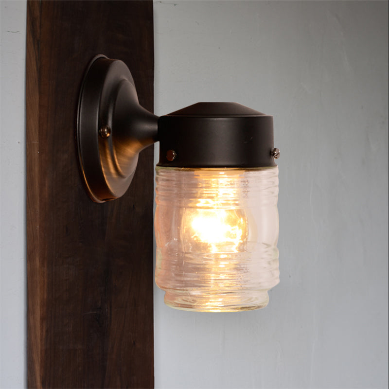 Cylindrical Clear Glass Wall Sconce Modern 1 Light Black/White Wall Mounted Light Fixture Clearhalo 'Cast Iron' 'Glass' 'Industrial' 'Modern wall lights' 'Modern' 'Tiffany' 'Traditional wall lights' 'Wall Lamps & Sconces' 'Wall Lights' Lighting' 1401791