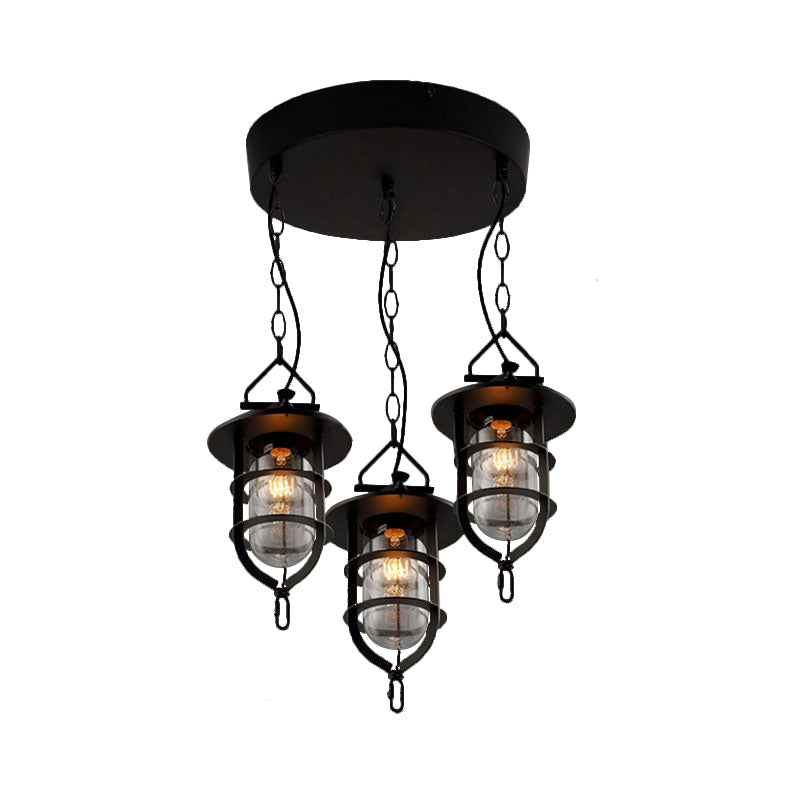 Caged Clear Glass Multi Pendant Vintage 3-Light Living Room Hanging Light Fixture in Black with Round Canopy Clearhalo 'Ceiling Lights' 'Glass shade' 'Glass' 'Industrial Pendants' 'Industrial' 'Middle Century Pendants' 'Pendant Lights' 'Pendants' 'Tiffany' Lighting' 141080
