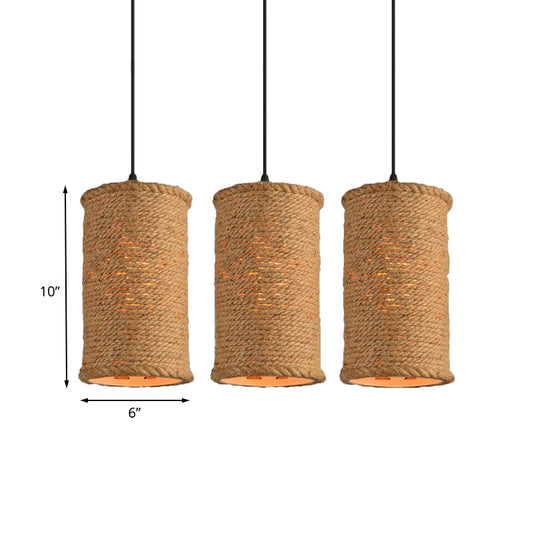 Cylindrical Dining Room Ceiling Hanging Light Country Rope 3 Lights Beige Pendant Lamp with Adjustable Cord Clearhalo 'Ceiling Lights' 'Industrial Pendants' 'Industrial' 'Middle Century Pendants' 'Pendant Lights' 'Pendants' 'Tiffany' Lighting' 141580