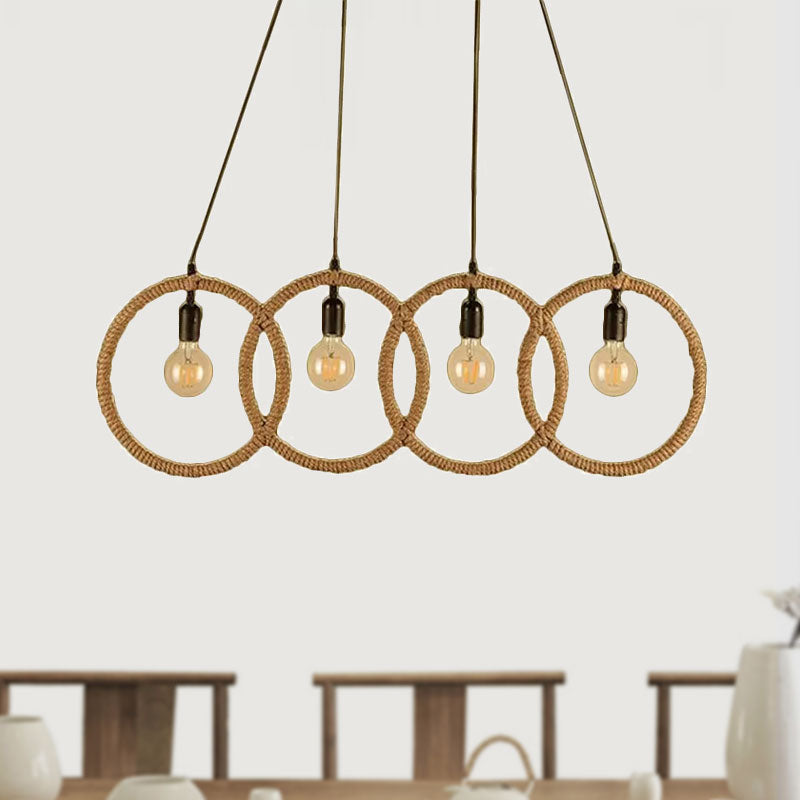 Black Finish Four-Ring Ceiling Pendant Lodge Style Manila Rope 4 Lights Coffee Shop Hanging Light Clearhalo 'Ceiling Lights' 'Industrial Pendants' 'Industrial' 'Middle Century Pendants' 'Pendant Lights' 'Pendants' 'Tiffany' Lighting' 1415999