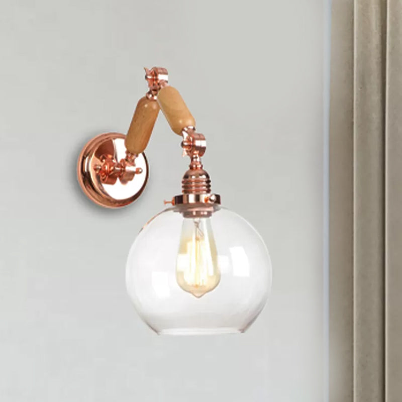1 Bulb Globe Wall Mounted Light Fixture Rustic Rose Gold Clear Glass Lighting with Extendable Arm Clearhalo 'Cast Iron' 'Glass' 'Industrial wall lights' 'Industrial' 'Middle century wall lights' 'Modern' 'Tiffany' 'Traditional wall lights' 'Wall Lamps & Sconces' 'Wall Lights' Lighting' 1416211
