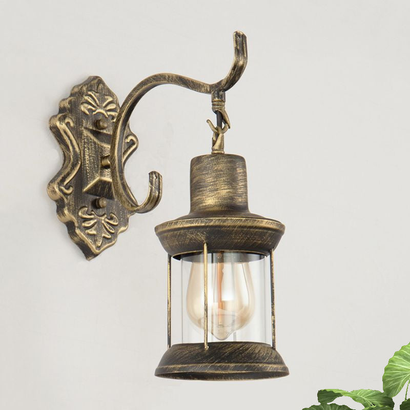 1 Bulb Kerosene Wall Mounted Light Fixture Rustic Style Aged Bronze Clear Glass Lighting with Carved Pattern Clearhalo 'Art deco wall lights' 'Cast Iron' 'Glass' 'Industrial wall lights' 'Industrial' 'Middle century wall lights' 'Modern' 'Rustic wall lights' 'Tiffany' 'Traditional wall lights' 'Wall Lamps & Sconces' 'Wall Lights' Lighting' 1416371