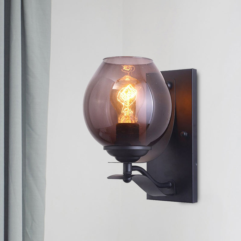 One Light Wall Sconce Lighting with Orb Shade Grey Glass Industrial Coffee Shop Light Fixture in Black Clearhalo 'Cast Iron' 'Glass' 'Industrial wall lights' 'Industrial' 'Middle century wall lights' 'Modern' 'Tiffany' 'Traditional wall lights' 'Wall Lamps & Sconces' 'Wall Lights' Lighting' 1418357