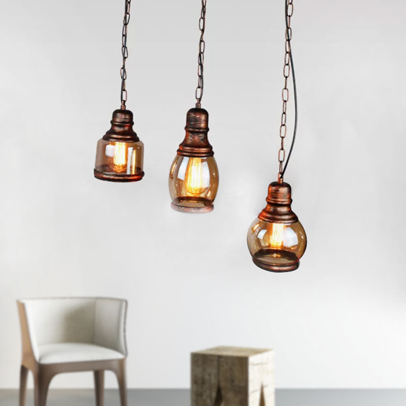 Rust Bottle Shade Multi Pendant Rustic Clear Glass 1 Light Coffee Shop Hanging Ceiling Light with Linear Canopy Clearhalo 'Art Deco Pendants' 'Cast Iron' 'Ceiling Lights' 'Ceramic' 'Crystal' 'Industrial Pendants' 'Industrial' 'Metal' 'Middle Century Pendants' 'Pendant Lights' 'Pendants' 'Tiffany' Lighting' 1418667
