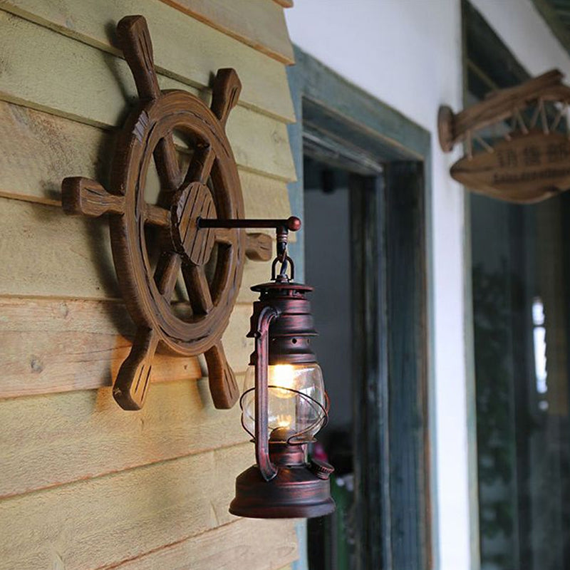 Lantern Clear Glass Wall Mounted Lamp Industrial Single Bulb Bedroom Sconce Light in Rust with Wood Rudder Clearhalo 'Industrial wall lights' 'Industrial' 'Middle century wall lights' 'Rustic wall lights' 'Tiffany' 'Wall Lamps & Sconces' 'Wall Lights' Lighting' 1419171