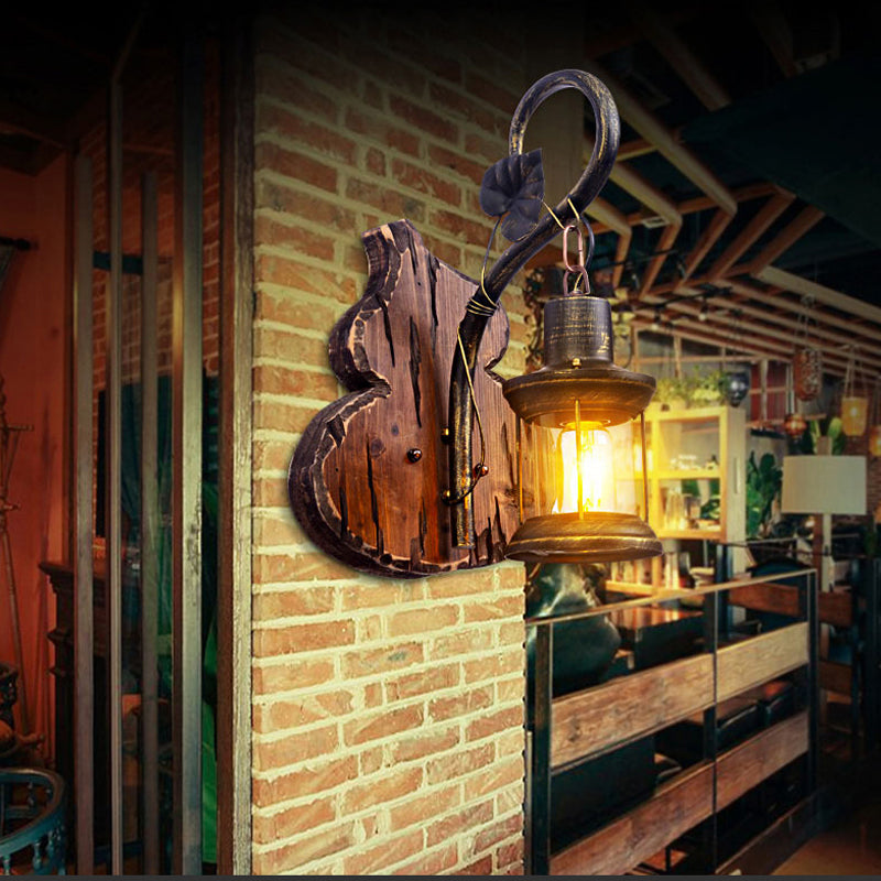 Coastal Lantern Wall Lighting Fixture 1 Bulb Clear Glass Sconce Light in Antique Brass with Gourd Backplate Clearhalo 'Industrial wall lights' 'Industrial' 'Middle century wall lights' 'Rustic wall lights' 'Tiffany' 'Wall Lamps & Sconces' 'Wall Lights' Lighting' 1419252