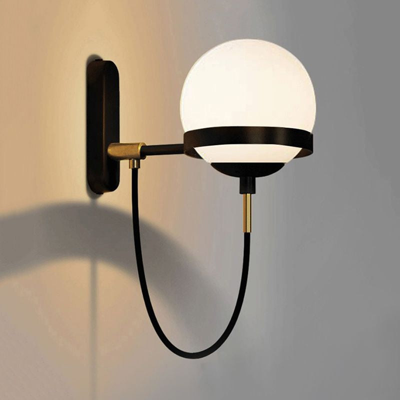Black/Gold Globe Wall Lighting Modern Clear/Frosted Glass 1 Light Living Room Sconce Light Fixture Clearhalo 'Art deco wall lights' 'Cast Iron' 'Glass' 'Industrial wall lights' 'Industrial' 'Middle century wall lights' 'Modern' 'Rustic wall lights' 'Tiffany' 'Traditional wall lights' 'Wall Lamps & Sconces' 'Wall Lights' Lighting' 1420593