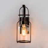 Cylinder Clear Glass Wall Mounted Lamp Industrial Single Bulb Living Room Sconce Light in Black/White/Rust with Cage Clearhalo 'Cast Iron' 'Glass' 'Industrial wall lights' 'Industrial' 'Middle century wall lights' 'Modern' 'Tiffany' 'Traditional wall lights' 'Wall Lamps & Sconces' 'Wall Lights' Lighting' 1420601
