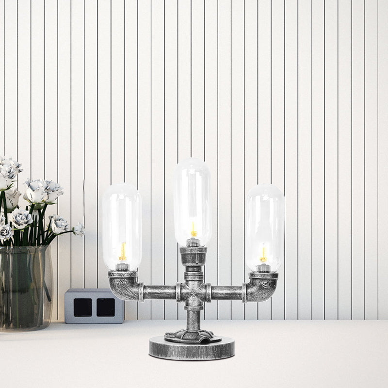 Capsule Clear/Amber Glass Night Light Farmhouse 2/3 Heads Tearoom LED Table Lamp with Pipe Base Clearhalo 'Lamps' 'Table Lamps' Lighting' 1423809