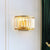 Demilune Crystal Wall Light Sconce Post-Modern 2 Bulbs Living Room Wall Mount Lamp in Black/Gold Gold Clearhalo 'Cast Iron' 'Glass' 'Industrial' 'Modern wall lights' 'Modern' 'Tiffany' 'Traditional wall lights' 'Wall Lamps & Sconces' 'Wall Lights' Lighting' 1432457