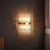 2-Bulb Layered Flush Wall Sconce Postmodern Clear Crystal Rod Wall Lighting Ideas Clear Clearhalo 'Cast Iron' 'Glass' 'Industrial' 'Modern wall lights' 'Modern' 'Tiffany' 'Traditional wall lights' 'Wall Lamps & Sconces' 'Wall Lights' Lighting' 1432465